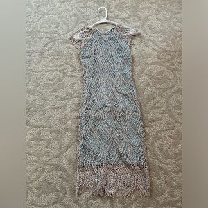 Beautiful gold dress with lace detailing. Used. Great condition.